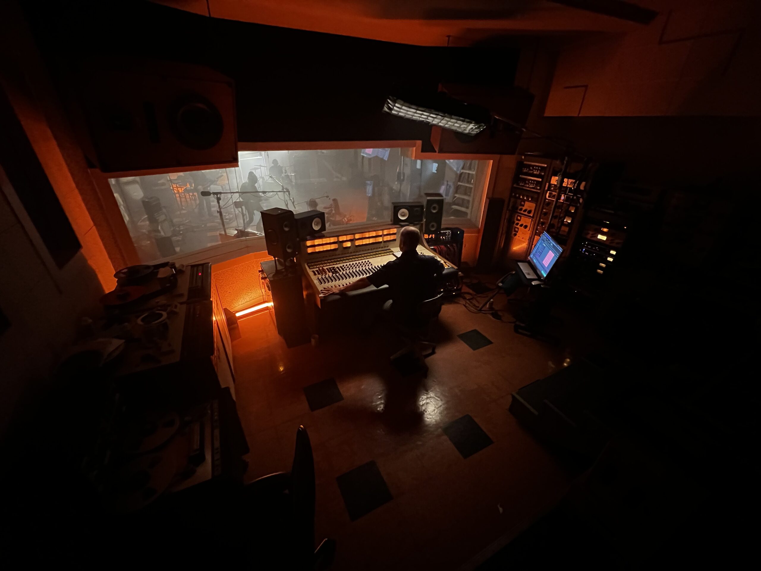 Moody overhead shot of the studio with orange glow